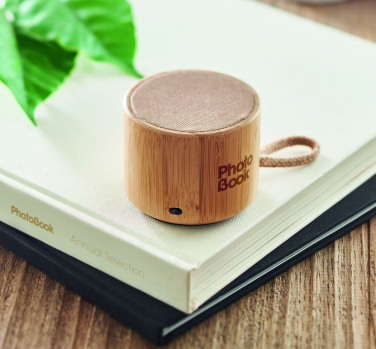 Logo trade advertising product photo of: Round bamboo wireless speaker