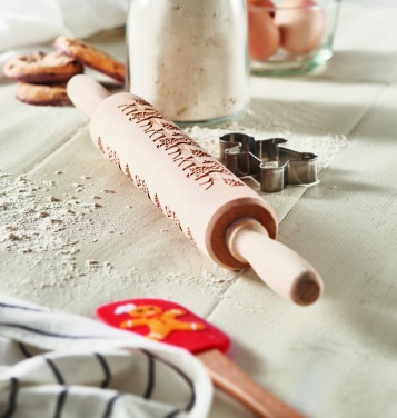 Logotrade firmakingi foto: Jõulutaigna puidust rullimine