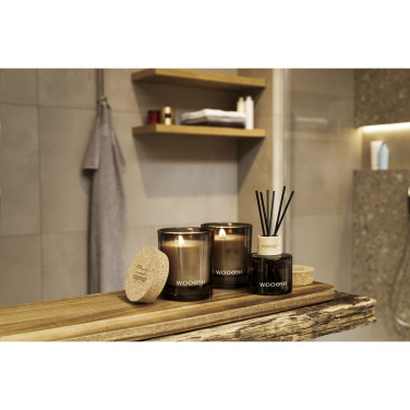 Logo trade firmakingitused foto: Woooshi lõhnaküünal korgist kaanega